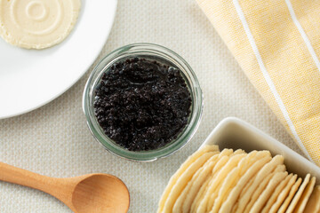 A top down view of a jar of vegan seaweed caviar. © DAVID