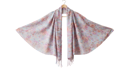 Elegant floral-patterned shawl draped on a hanger, showcasing its soft texture and vibrant colors against a clean background