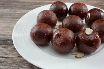 A closeup view of a plate of kala jamun.