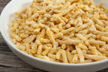 A closeup view of a bowl of sweet sev seerni.