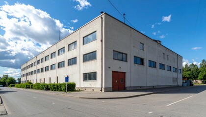 Modern Industrial Building with Clear Sky and Urban Landscape