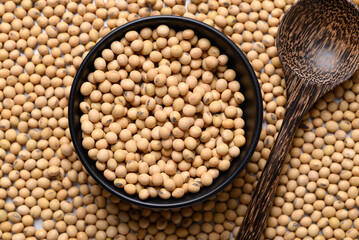 Soybean seeds in bowl with spoon, Food ingredient, Top view