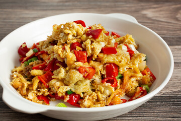 A closeup view of a Chinese spicy scrambled egg entree.
