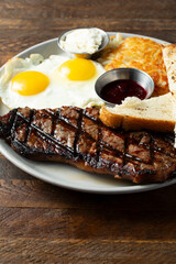 A view of a steak and eggs plate.