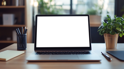 Professional Workspace with a Laptop on Desk Featuring Transparent PNG Cutout Screen and Notepad Nearby