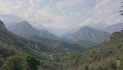 Scenic panorama of mountain ranges covered with snow in the distance