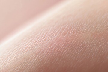 Fototapeta premium Close-up view of smooth skin texture showcasing natural moisture and subtle details. ideal for beauty or skincare product promotions