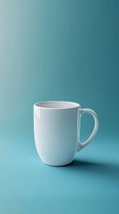 Obraz premium Simple White Mug on Soft Blue Background with Elegant Lighting