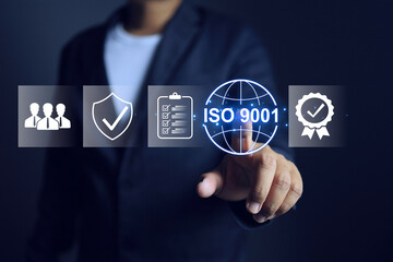 iso 9001 quality management system concept with businessman pointing on icon system to continue and maintain the quality in product and service and communicate standard of the company