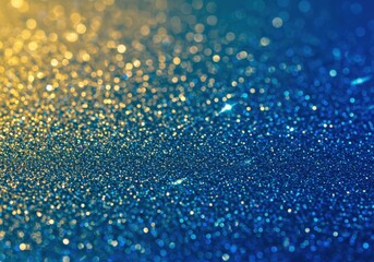 A glittering abstract background with gold and blue hues, showcasing shimmering bokeh effects.