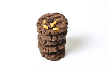 Close up view of five cookies with peanut and chocolate chips. Freshly Baked Homemade. perfect for bakery advertisements and dessert menus. Clipping path. Stack. Pile. Isolated on white background.