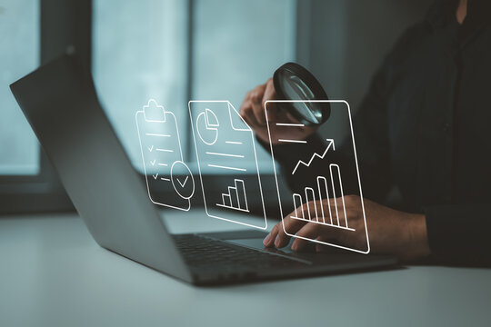 Digital inspection of business reports and performance charts using modern analytics tools.
