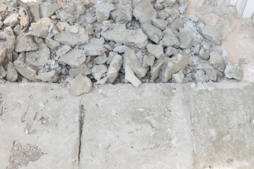 Close up scrape or crushed concrete from breaking, demolish to remove tile and concrete floor...