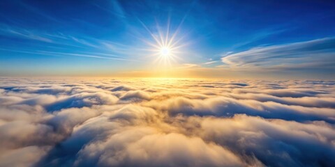 Obraz premium A breathtaking aerial view of a sunlit seascape of clouds, a majestic panorama of nature's artistry, showcasing the serene beauty of a vibrant sunrise above a boundless ocean of fluffy white clouds.