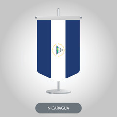 Nicaragua vertical table flag on light grey background. Nicaragua vertical desk flag isolated on grey background	