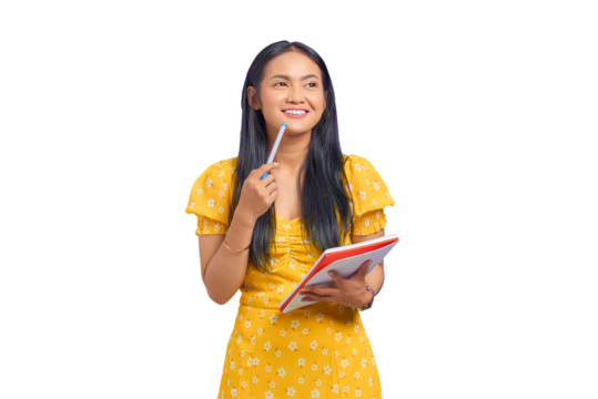Smiling young Asian woman holding pen and notebook, looking up isolated on transparent background