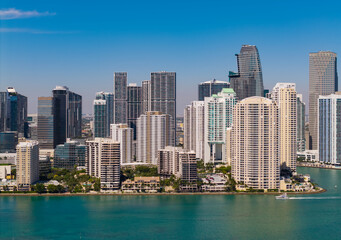 Fototapeta premium Panorama of Miami. Aerial view of modern skyscraper in downtown Miami, Brickell Key. Skyline of Miami. Brickell city center. Modern city building and skyscraper. City downtown skyline