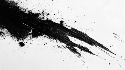 Obraz premium Abstract black ink splatter on a white background.