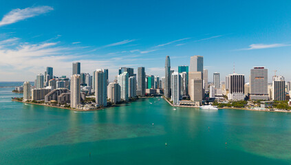 Fototapeta premium Panoramic modern architecture in Miami downtown, Florida. Miami skyline panoramic view. Aerial view of cityscape with skyscraper in Brickell Key, United States. Downtown Brickell Miami