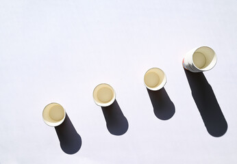 A series of images featuring disposable cups in various compositions, ideal for use in marketing, advertising, and eco-friendly campaigns.