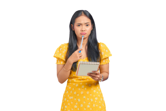 Pensive young Asian woman holding pen and notebook, thinking about idea isolated on transparent background