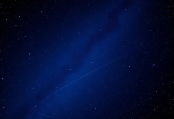 Fototapeta premium Dark blue night sky background, countless twinkling stars, infinite space , vastness, abstract