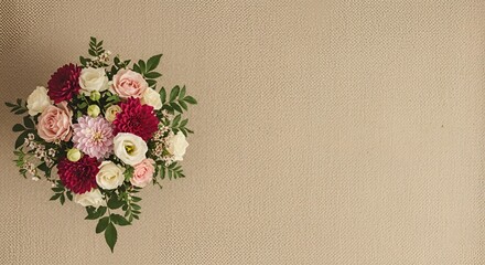 Bouquet of flowers on a wooden background with copy space