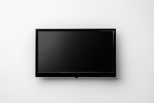 Black flat-screen TV mounted on white wall