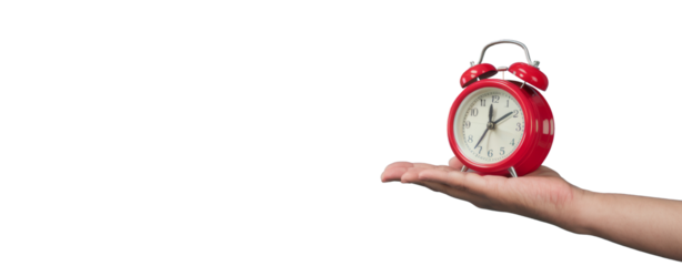 red alarm clock on hand, isolated on white background.