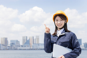 都会で働く作業員（作業服・作業着・スタッフ・建築・建設・仕事）
