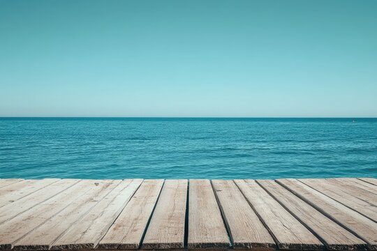 Tranquil wooden pier over vast ocean