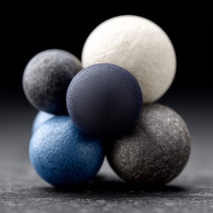 Abstract arrangement of textured spheres in various colors showcasing depth and dimension on a gradient background