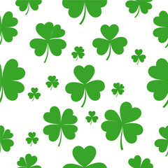 Seamless pattern of green shamrocks on a white background for St. Patrick's Day festive design Irish culture and luck celebration