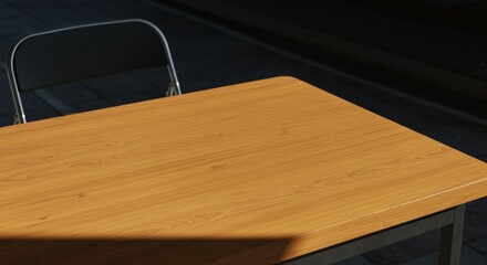 Light brown wooden table with folding chair