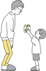 父の日にプレゼントを渡すこども