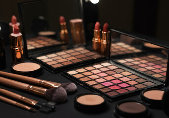 Makeup products neatly arranged on a table.