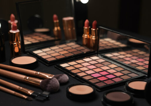 Makeup products neatly arranged on a table.