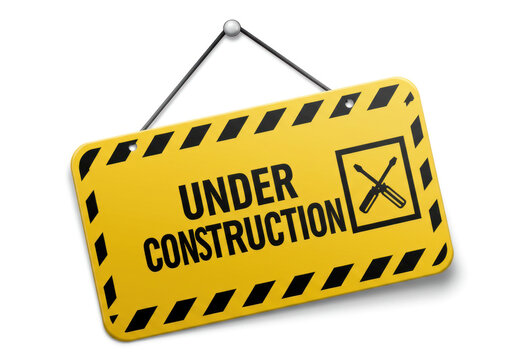 Under construction sign on wall.