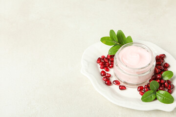 Self care and skincare products concept - pomegranate cosmetics