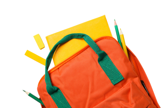 Bright orange backpack with school supplies on a white surface, isolated on white, PNG