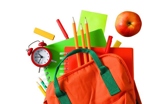 Colorful school items arranged with an apple and alarm clock, isolated on white, PNG