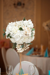 Luxury, elegant wedding reception table arrangement, floral centerpiece