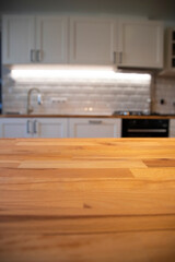 A clean and tidy kitchen with illuminating white walls