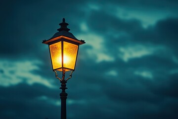 Illuminated lamp post at twilight