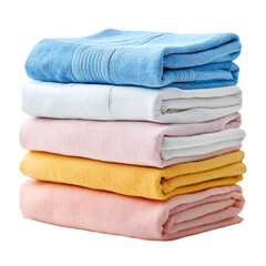 Stack of folded towels and sheets soft colors neat pile,