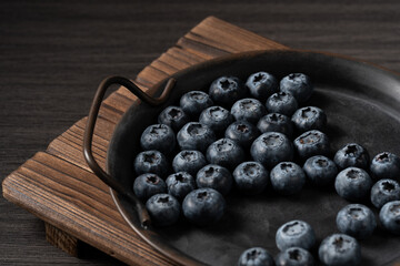 Fresh Blueberries in Rustic Metal Dish