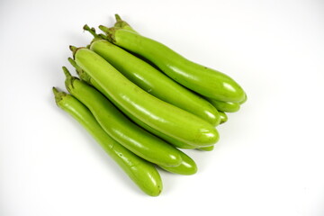 Fresh green long Thai eggplants isolated on white background