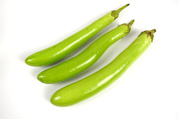 Fresh green long Thai eggplants isolated on white background