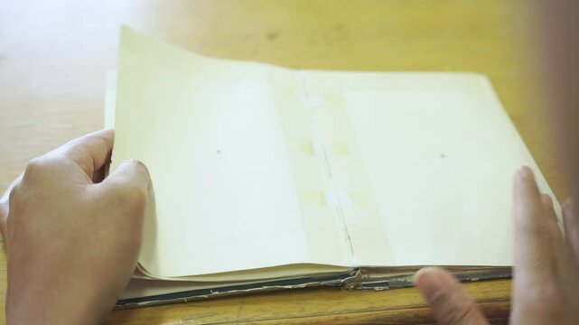 Man get color blindness tested with color blindness cards, vision and eye care concept