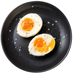 soft boiled eggs isolated on black plate
